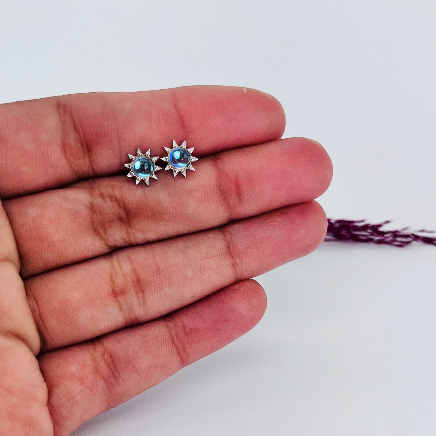 Aros de plata diseño de sol