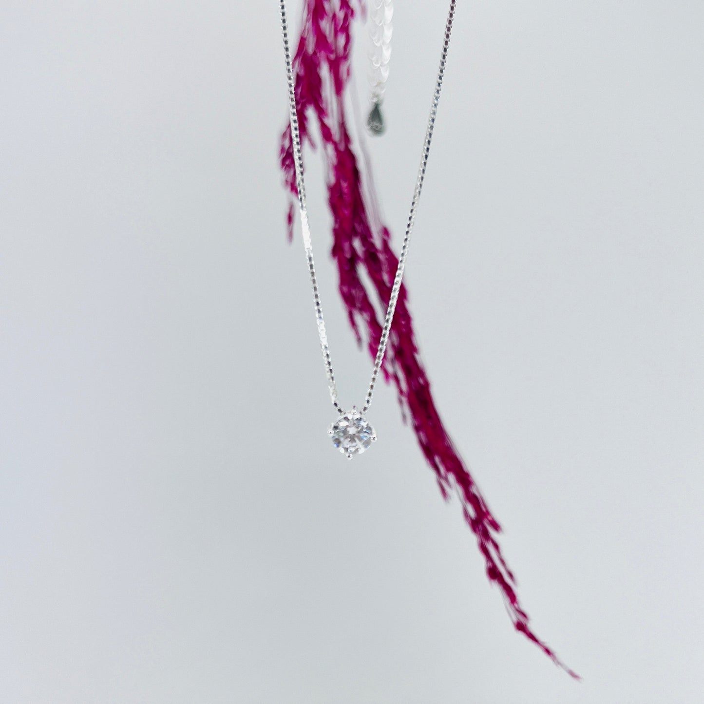 collar de plata punto de luz