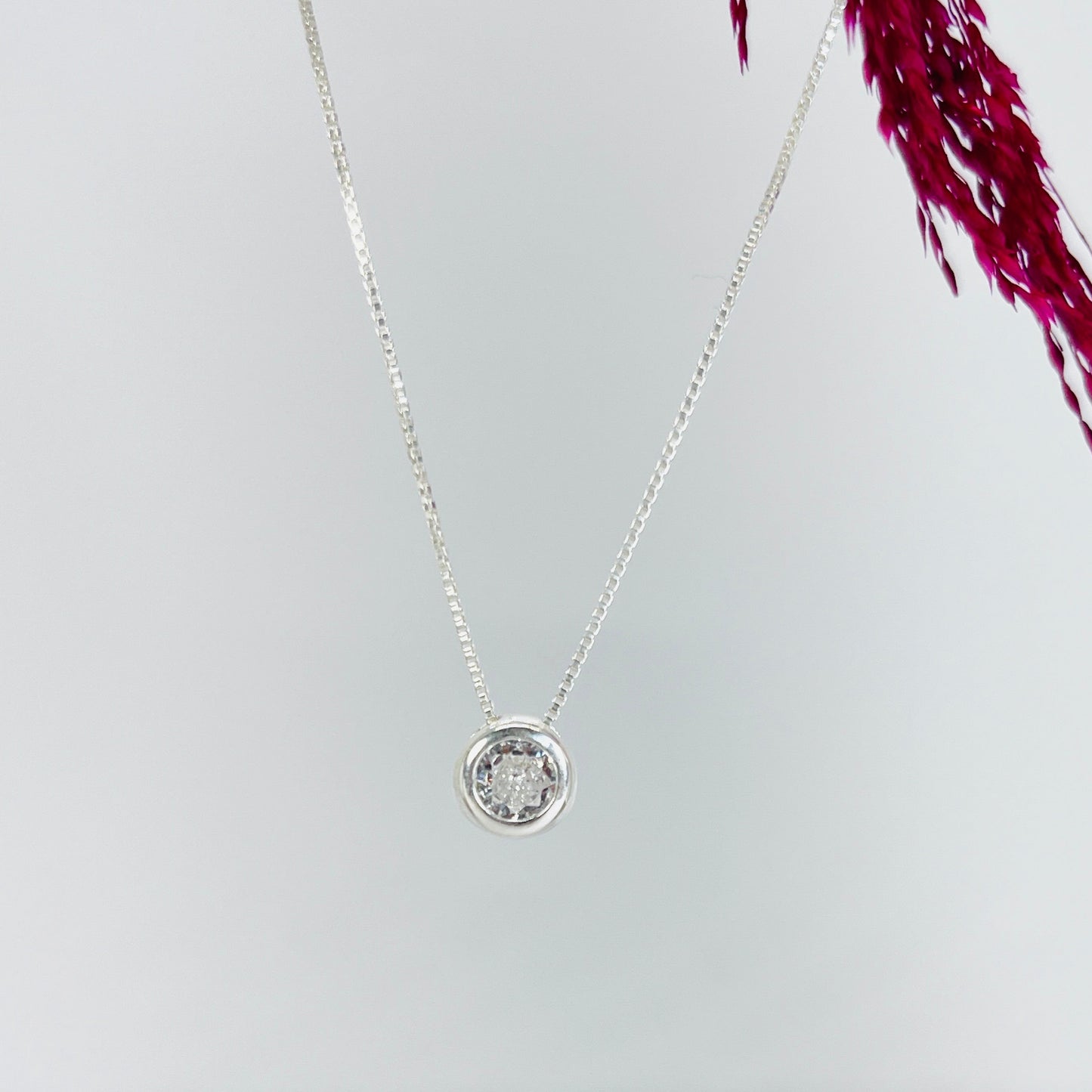 collar de plata punto de luz